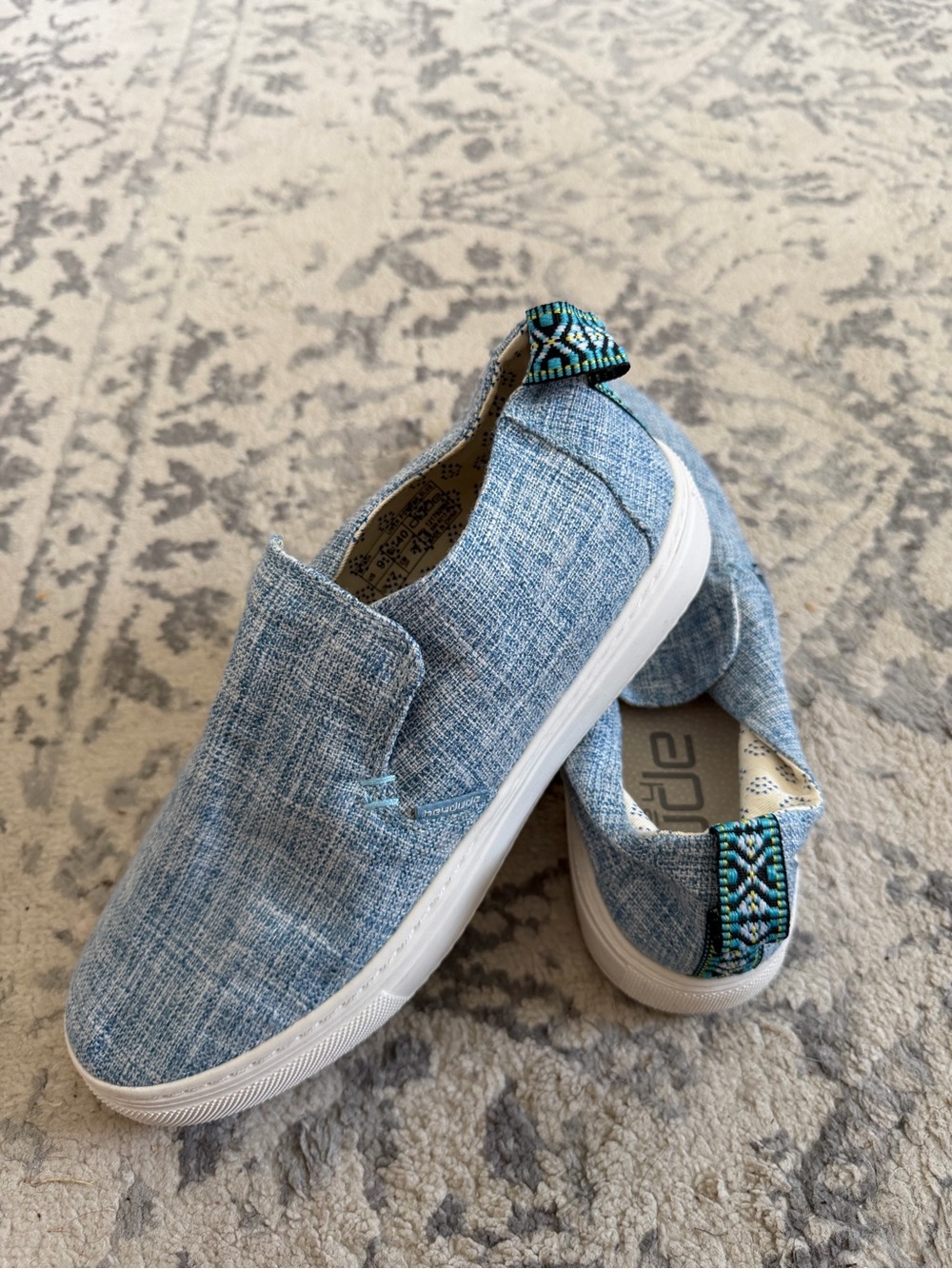 Hey Dude Women's Slip-On Sneakers in Light Blue with Patterned Heel Tab